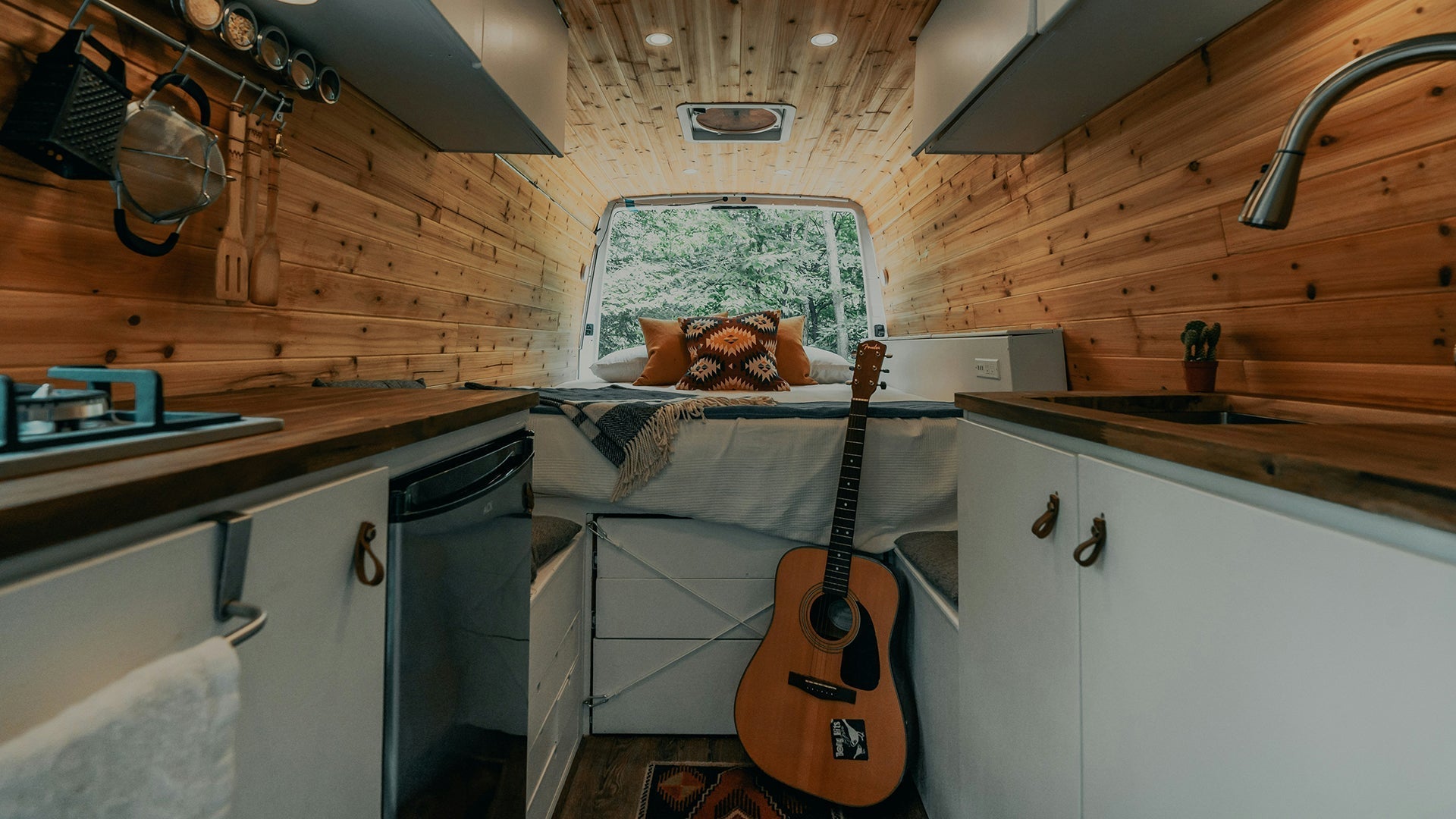 Caravan interior with off-grid appliances powered by pure sine wave inverter