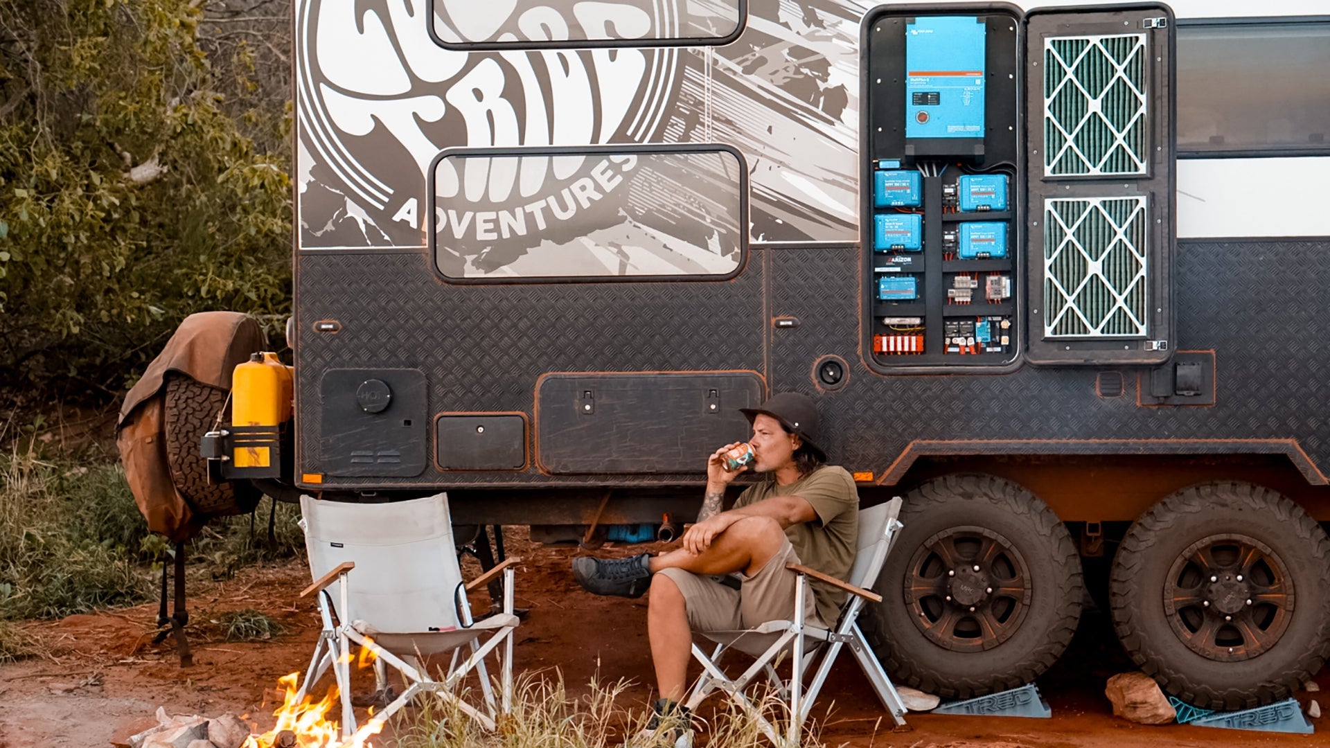 Off-grid caravan lithium battery charging system with inverter charger and solar power setup